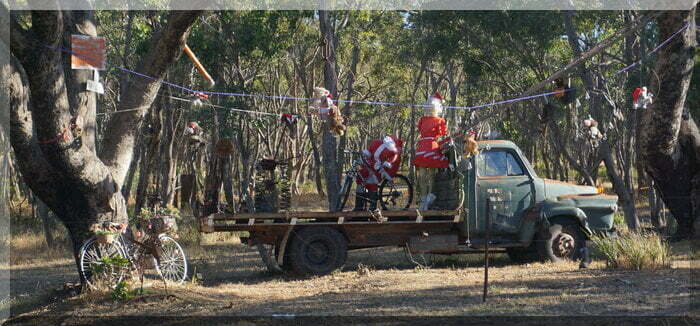 rusty ute in teh bush decorated for Christmas