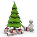 Adult with Christmas gifts under the tree