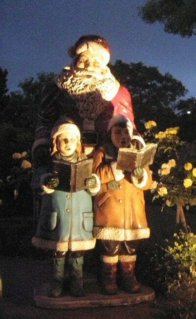 Santa and children singing carols