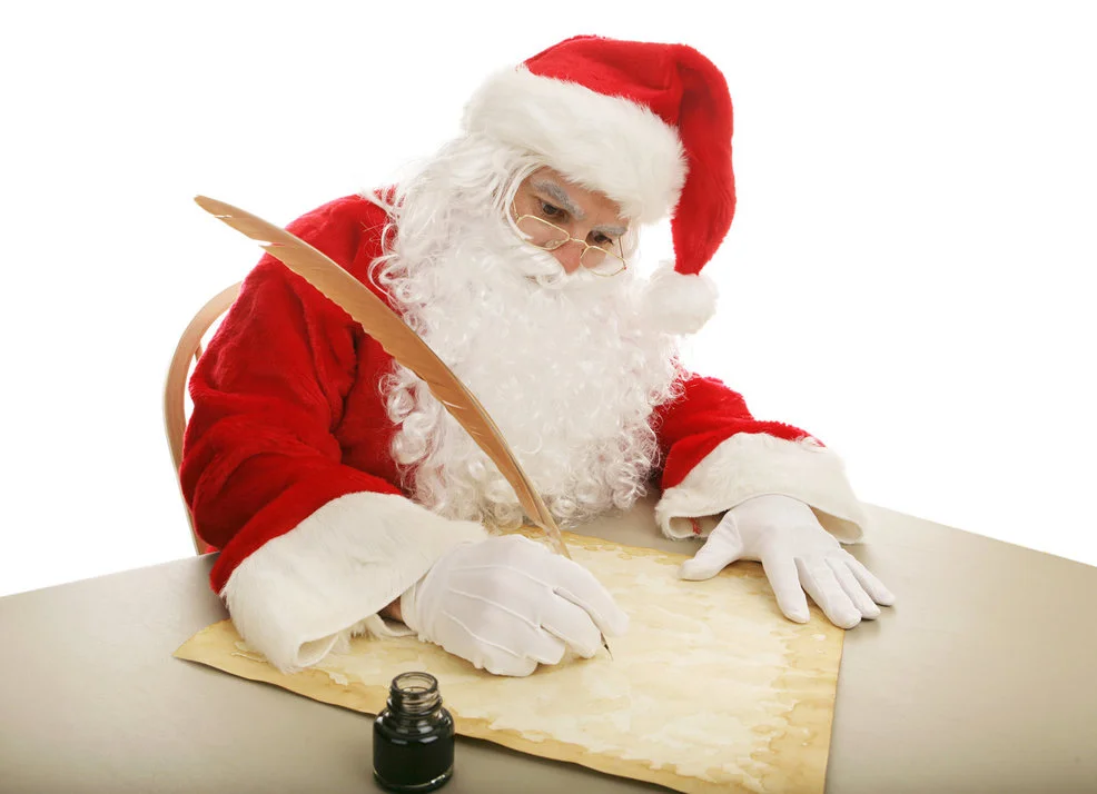 Santa_writing_quill_small Santa writing letters with a quill and ink pot!