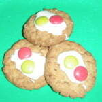 Christmas Anzac biscuits on a green plate