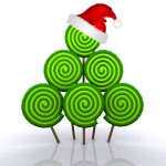 Santa hat on Christmas tree of green lollipops