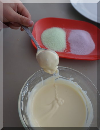 | love santa transferring balls from chocolate to jelly