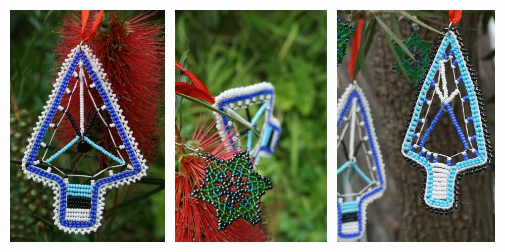 Beaded Christmas trees hanging on a bottlebrush tree