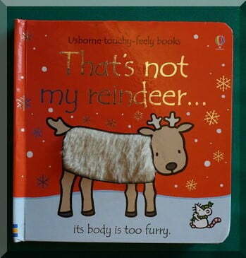 cover image of "That's not my reindeer" board book