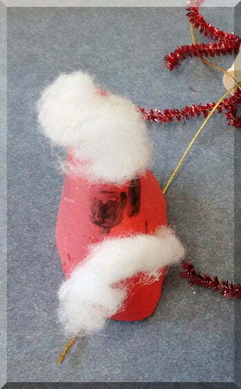 Red paper Santa face made by a child
