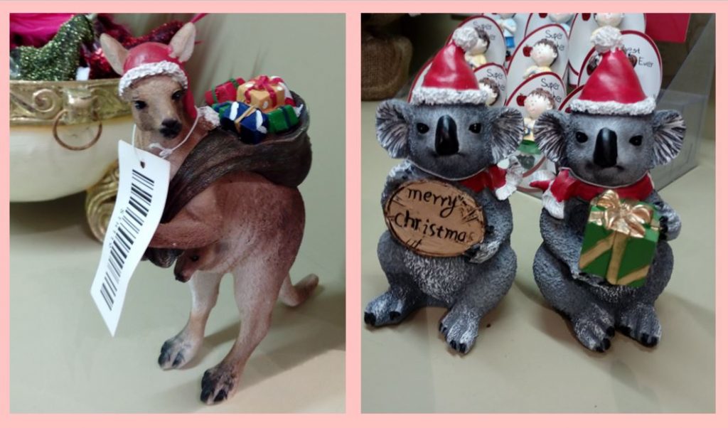| love santa A kangaroo and two koalas holding Santa sacks of toys
