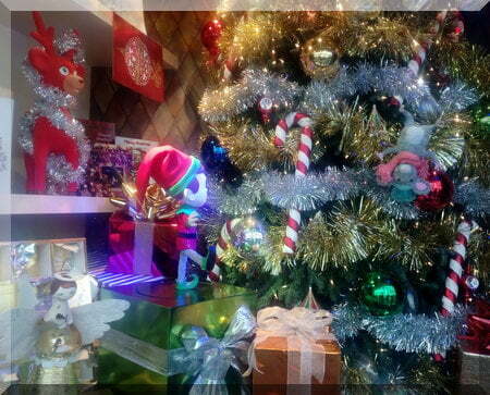 Reindeer, Angel, Elf and Mouse enjoy their Christmas tree