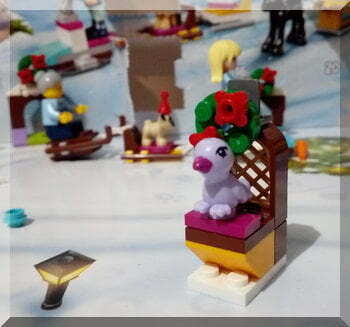 Lego bird on a fancy stand