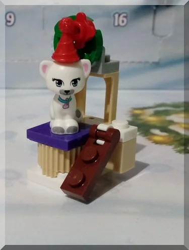 Lego cat on a scratching post stand