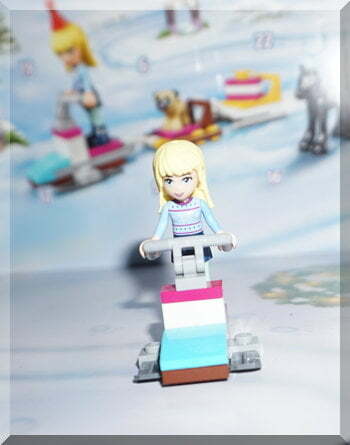 Lego girl on a ski-mobile