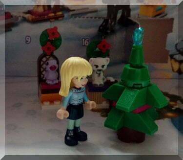 Lego Friends Christmas tree beside Stephanie