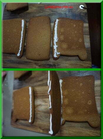 | love santa Sticking pieces of gingerbread together to form Santa's sleigh