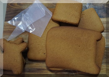 gingerbread pieces and an empty piping bag