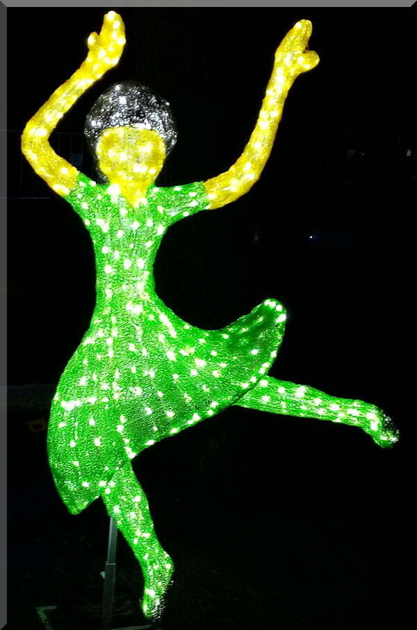 Christmas light sculpture of Lady in green dress dancing