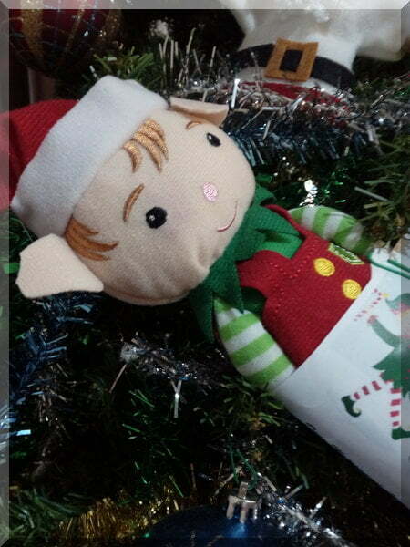 Soft elf, Tinkles, hiding in the Christ,as tree