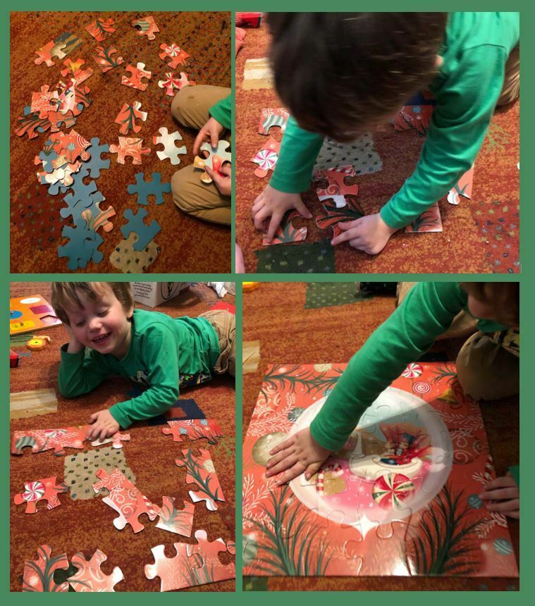 Young boy putting together the Nutcracker puzzle