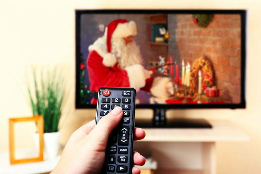 Santa in Christmas movie on a TV