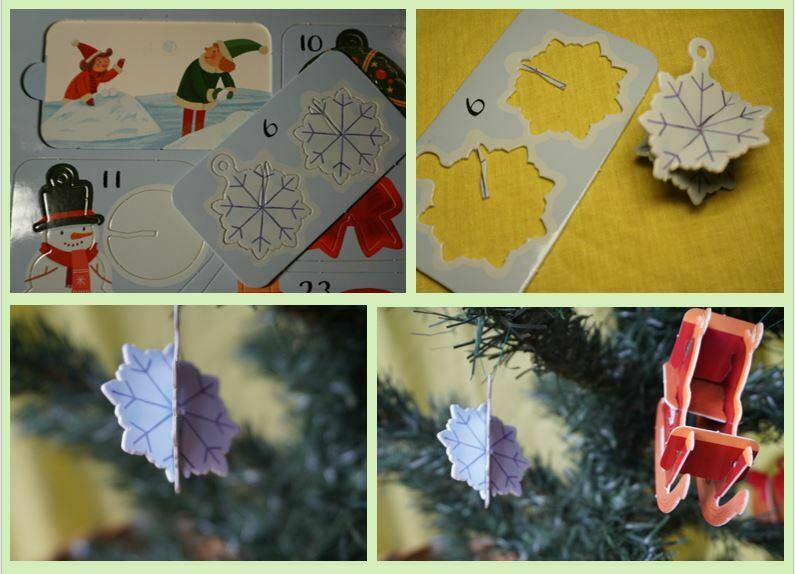 Cardboard nowflake Christmas decoration hanging on a tree and being pressed out of a book