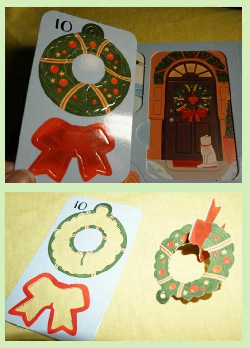 green wreath with red ribbon from the advent calendar