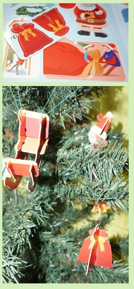 Santa's sack pressed out ornament hanging on a tree hear a sleigh