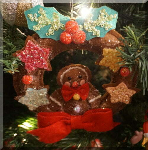 brown wreath with gingerbread man and stars