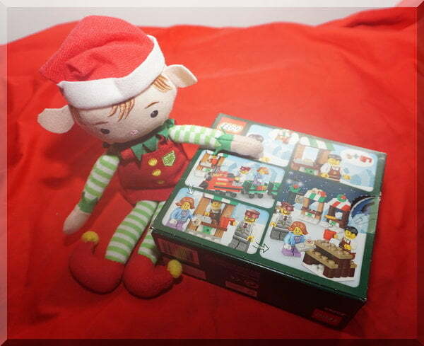 Tinkles the elf with a Lego train set box