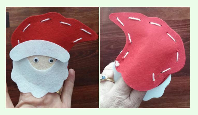 | love santa Santa finger puppet on adult fingers