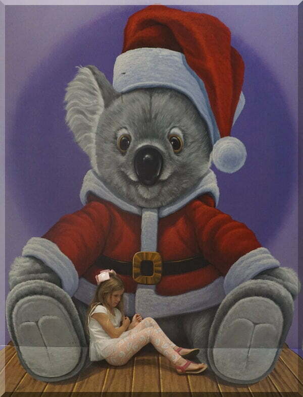Large koala in Santa outfit cuddling young girl