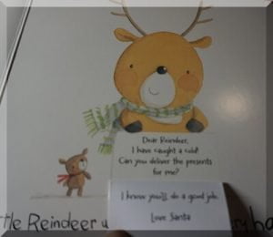 Inside page of a board book called The little reindeer who lost his presents
