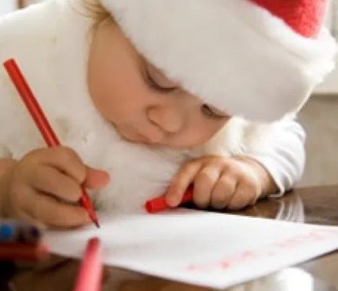 Santa sitting and reading a letter