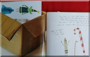 inner page of Crayon's Christmas with a puzzle in an envelope