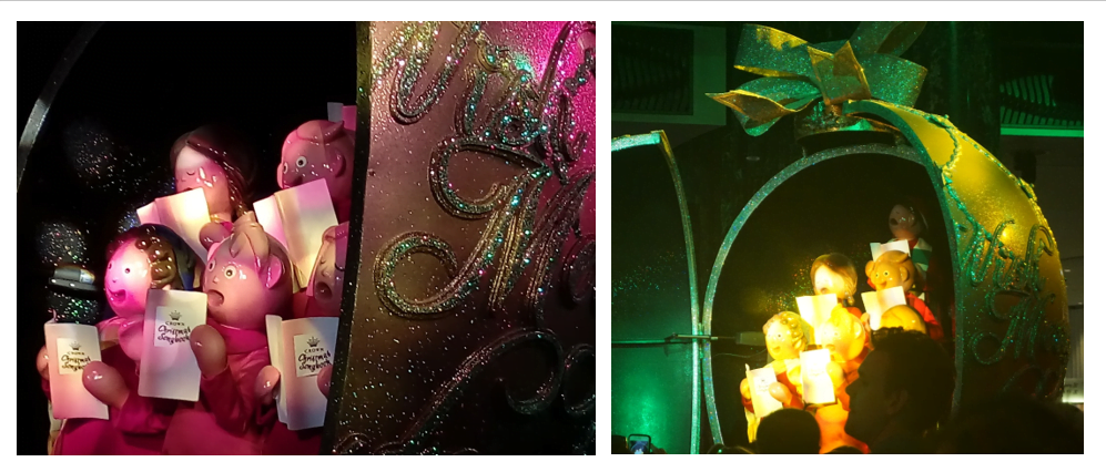 Choir in a goldne egg singing we wish you a merry Christmas