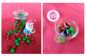 Cash_jar_smarties_santa | love santa Cash hidden in a jar of red and green sarties with A Santa ornament near by