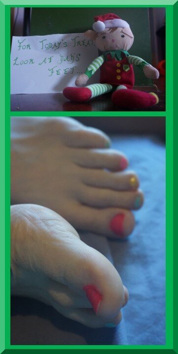 Elf-note-daddy-feet-raised | love santa A Christmas elf with a note and a man's feet with multi-coloured nailpolish