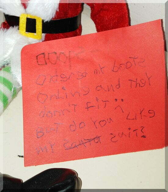 Elves-santa-mantlepiece-note-550 | love santa A red note held by a Christmas elf in a Santa suit