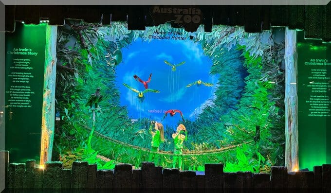 2024 Myer windows - wildlife warriors showing two Irwin children in a rainforest full of birds