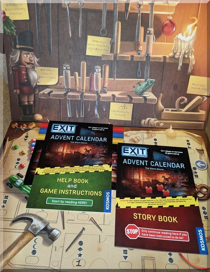 Exit-advent-680x879 | love santa Contents of the Exit escape advent calendar - find Santa - showing the box with the story book, help/instructions guide and decoder table